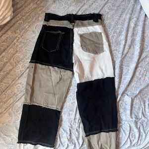 Black and white patchwork jeans with a unique design